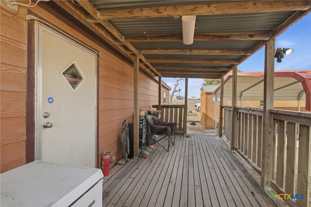 164 County Road 4450 Kempner, TX 76539 - Photo 20 of 42 a view of a balcony with wooden floor