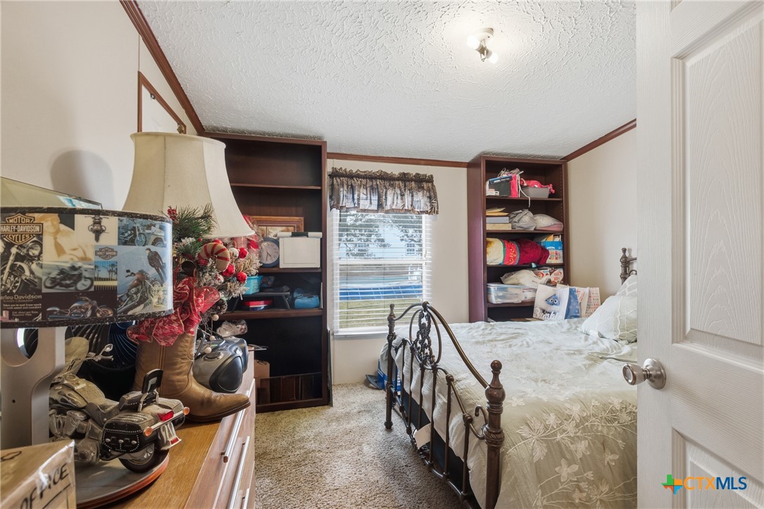 164 County Road 4450 Kempner, TX 76539 - Photo 34 of 42 a view of a livingroom with furniture and toys
