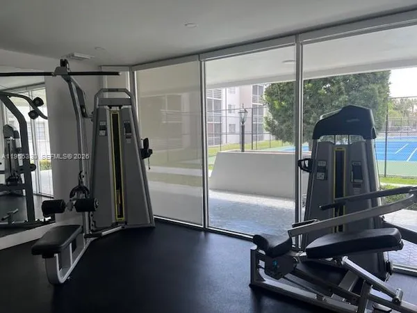 a view of a room with gym equipment