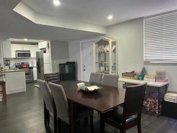 a view of a dining room with furniture