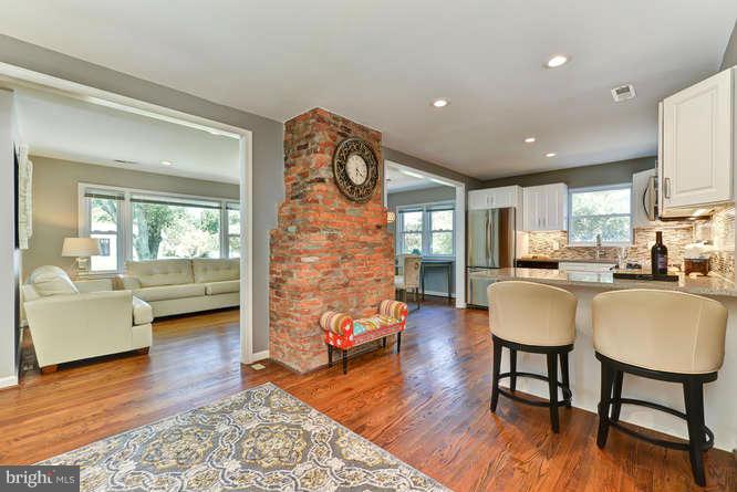 7923 Fairfax Road Alexandria, VA 22308 - Photo 8 of 29 a living room with furniture and a wooden floor