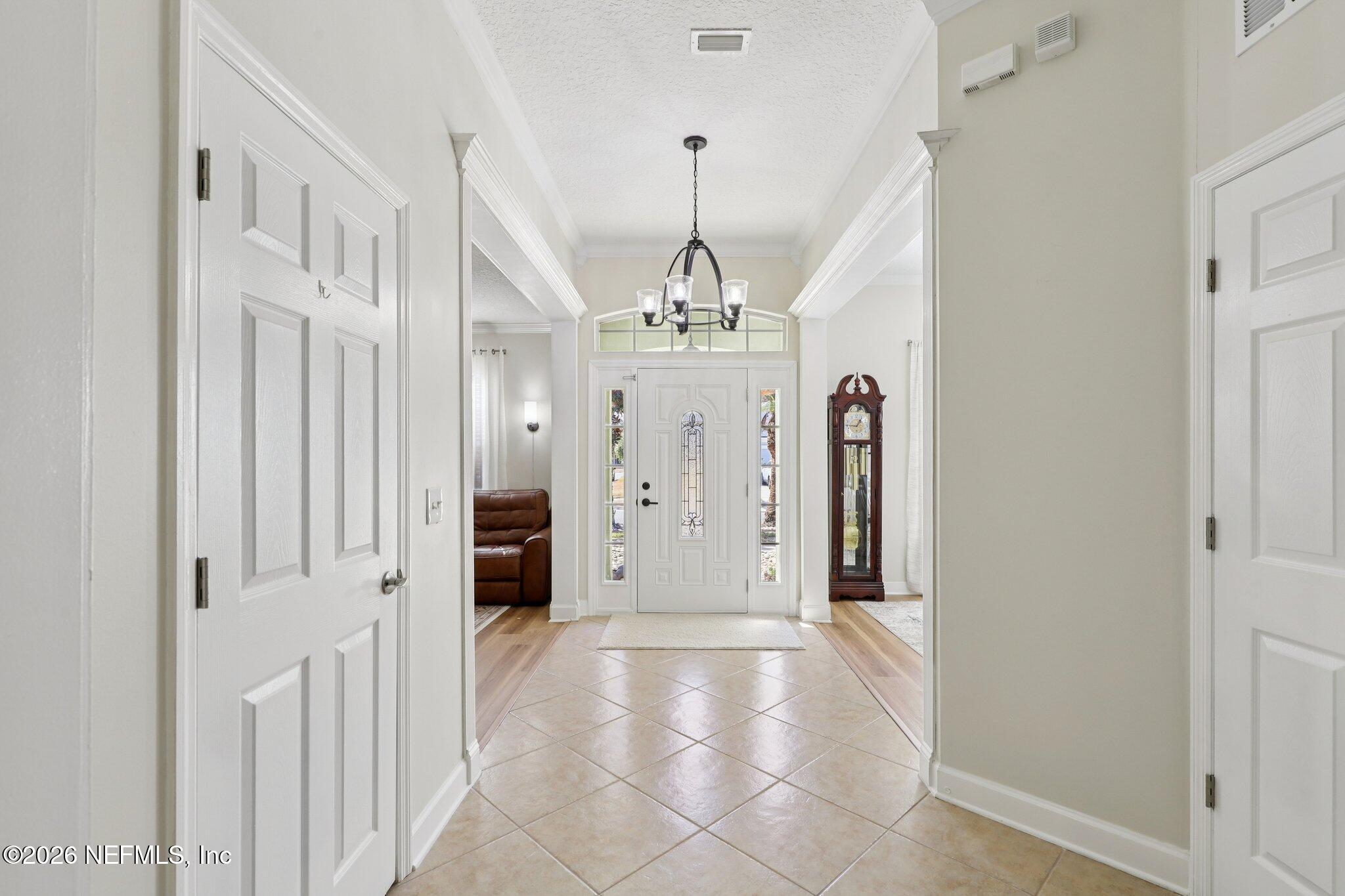 2430 Tall Cedars Road Fleming Island, FL 32003 - Photo 8 of 93 Foyer