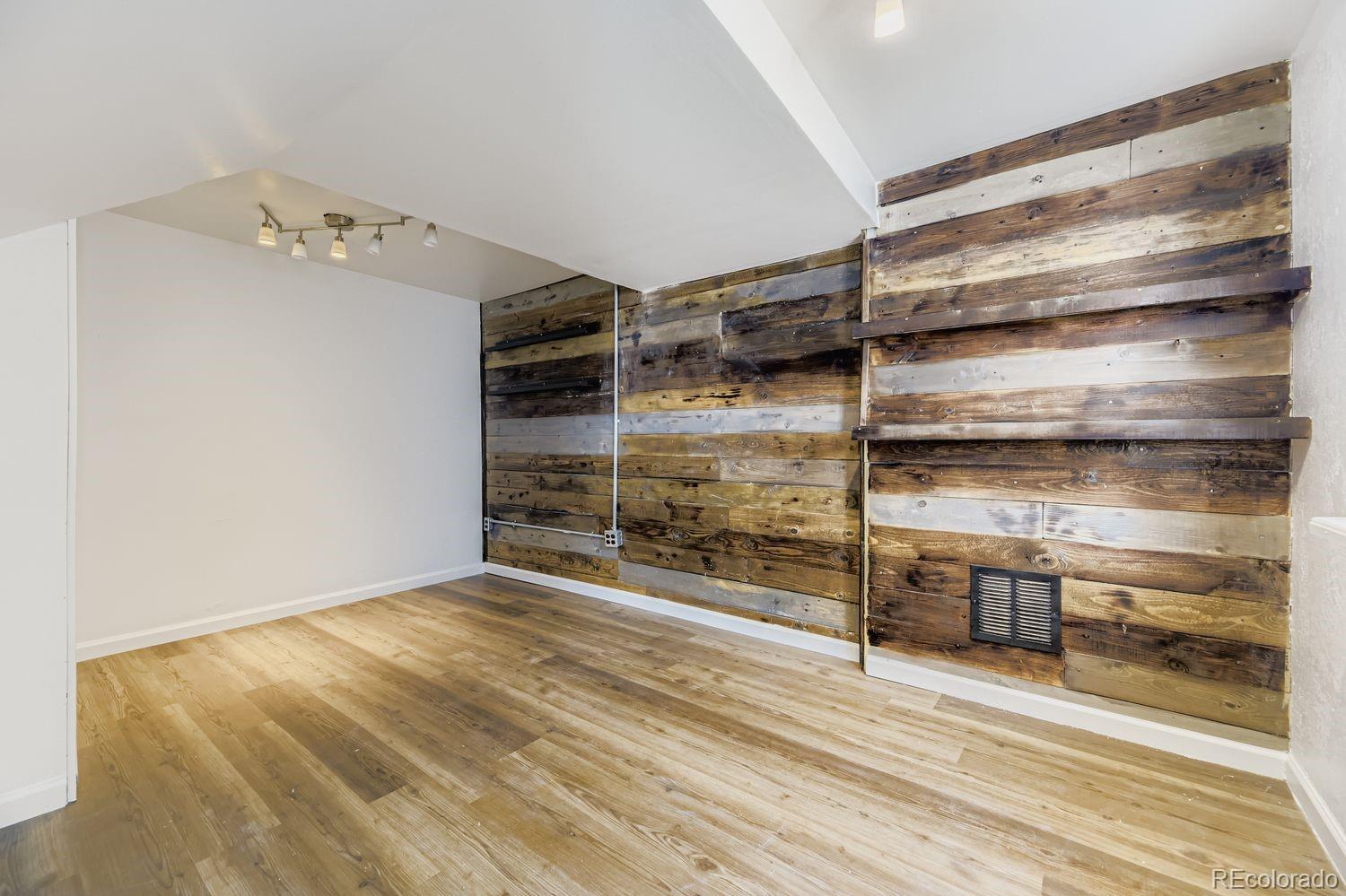 13073 South Stuart Way Parker, CO 80134 - Photo 15 of 23 a view of an empty room with a window