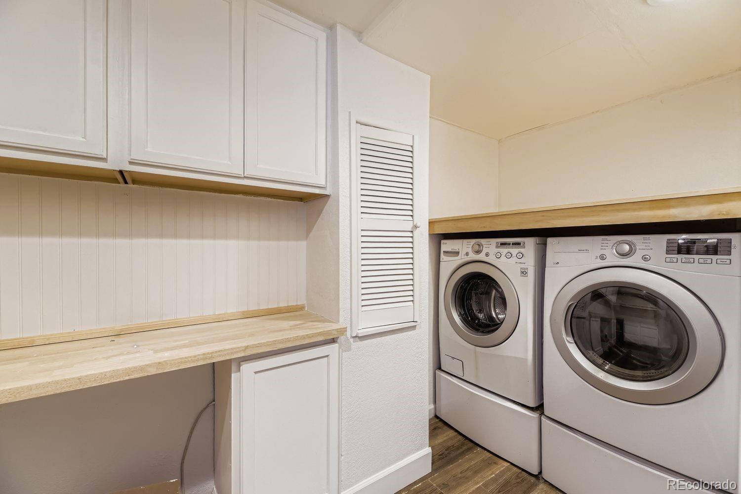 13073 South Stuart Way Parker, CO 80134 - Photo 19 of 23 a utility room with dryer and washer