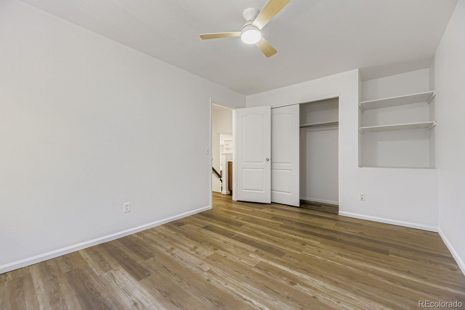 13073 South Stuart Way Parker, CO 80134 - Photo 10 of 23 a view of an empty room with a window