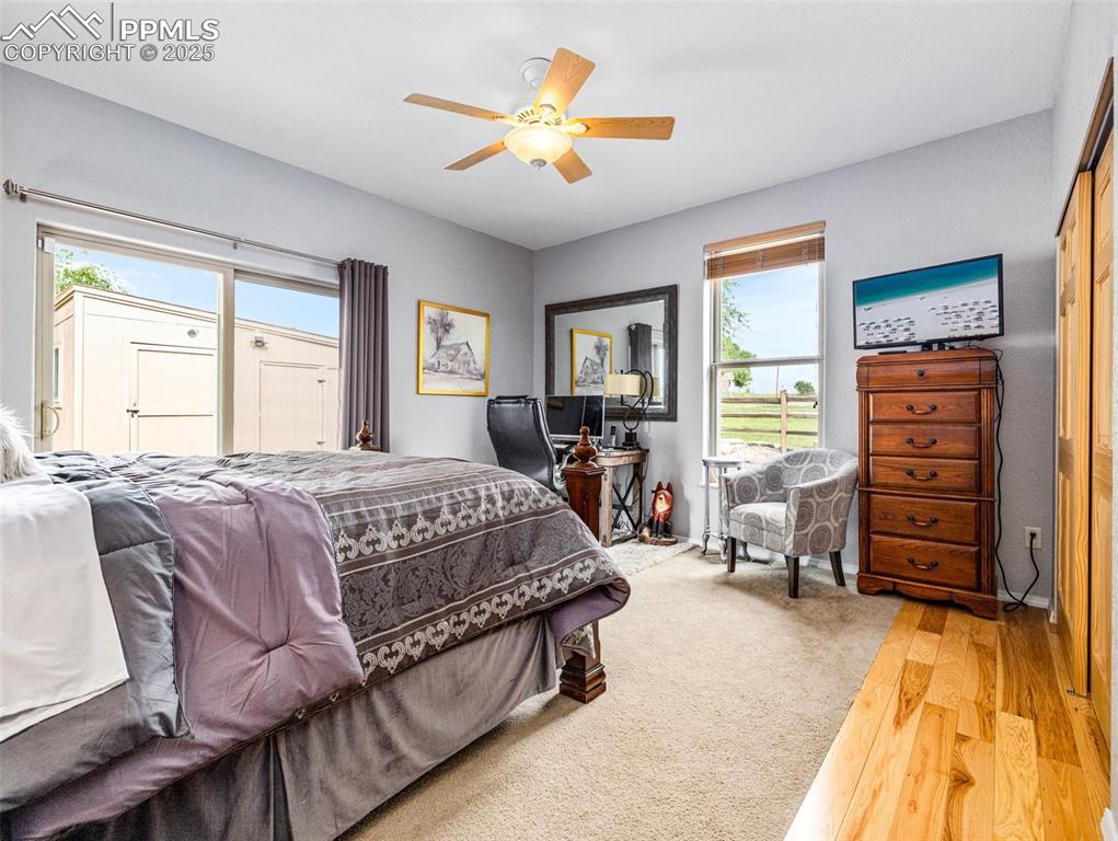 Undisclosed Address Colorado City, CO 81019 - Photo 24 of 46 a spacious bedroom with a bed and a chandelier