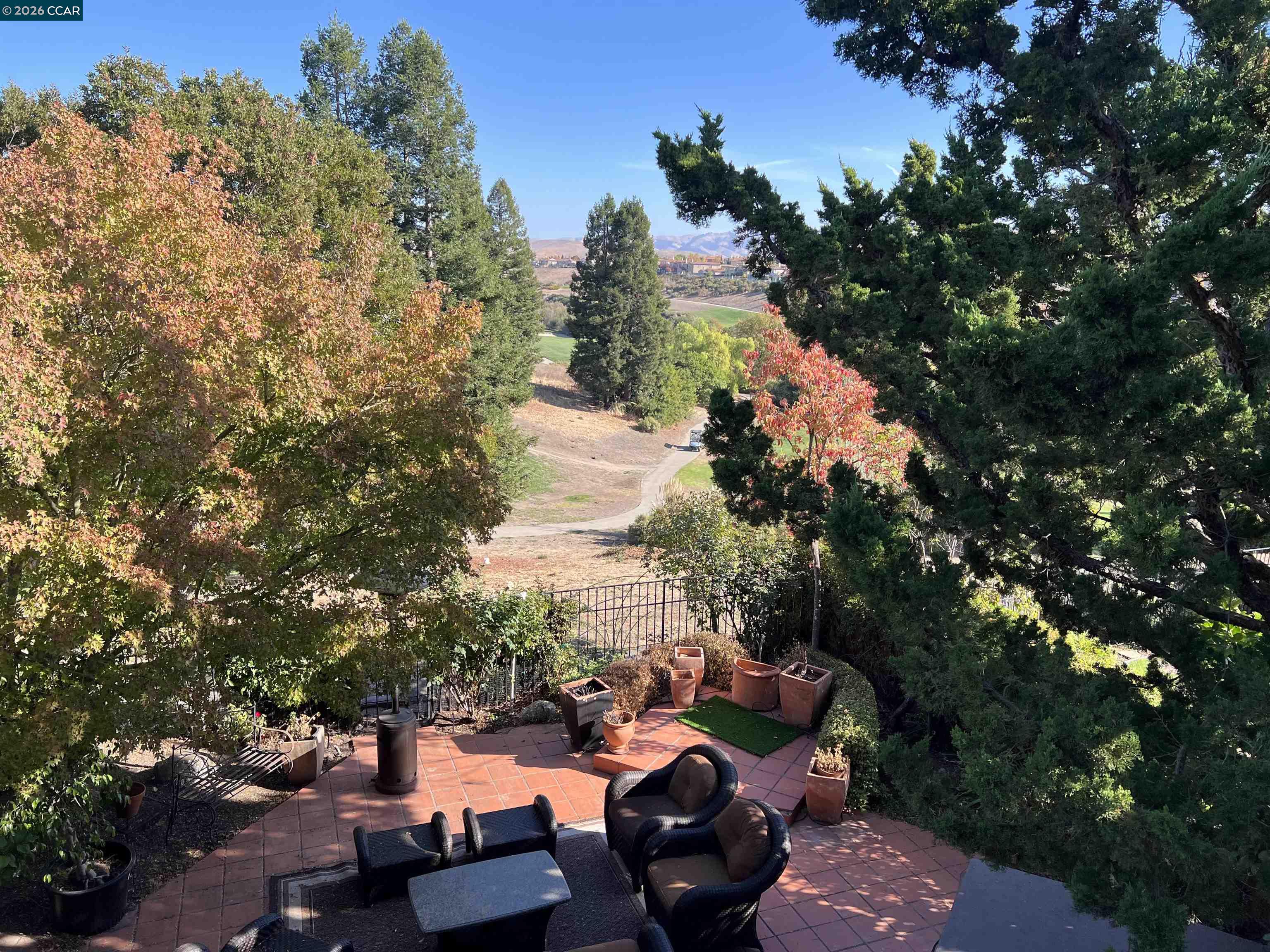 a view of a patio with furniture