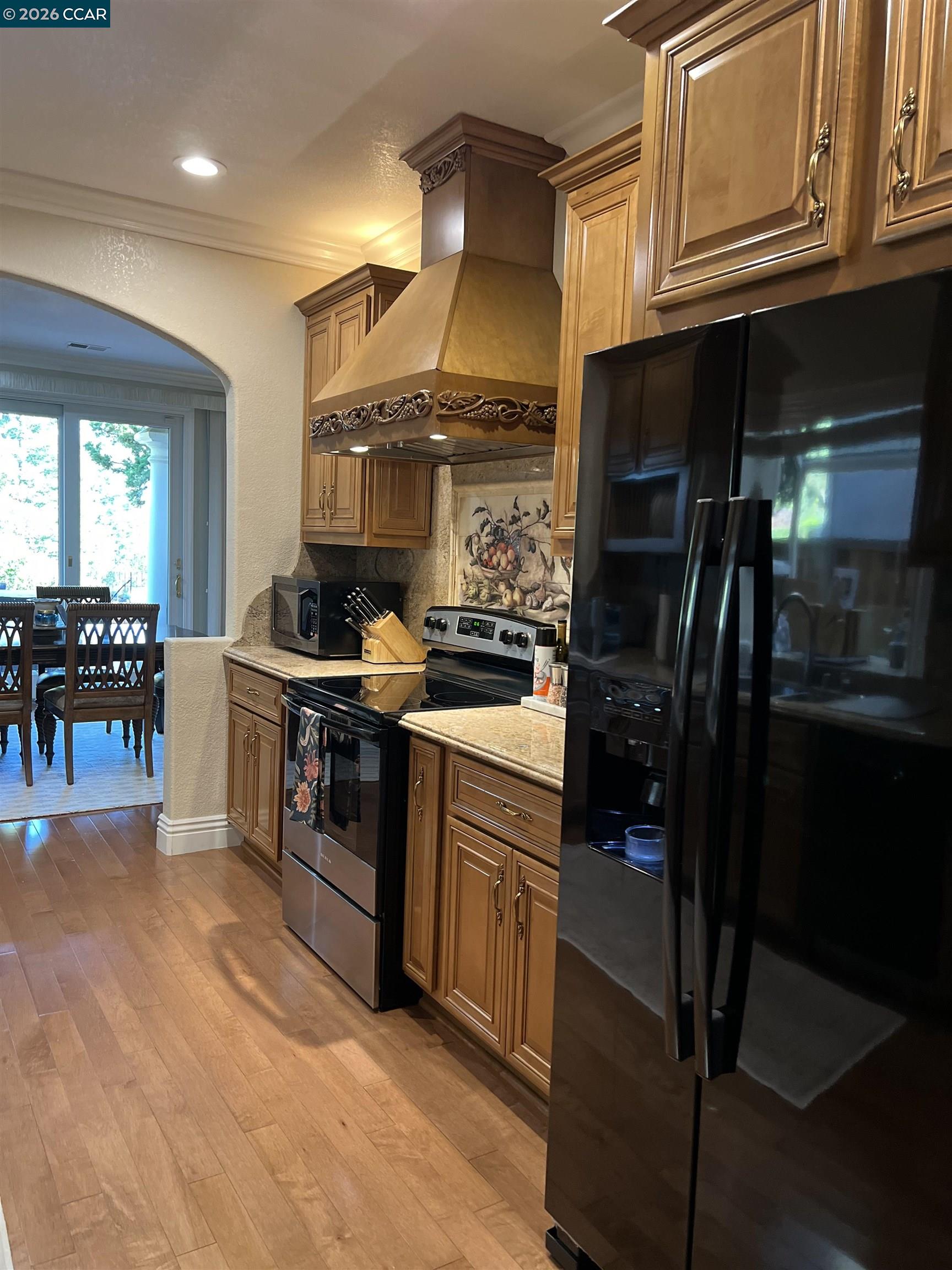 1312 Canyon Side Avenue San Ramon, CA 94582 - Photo 11 of 41 a kitchen with a stove and a refrigerator