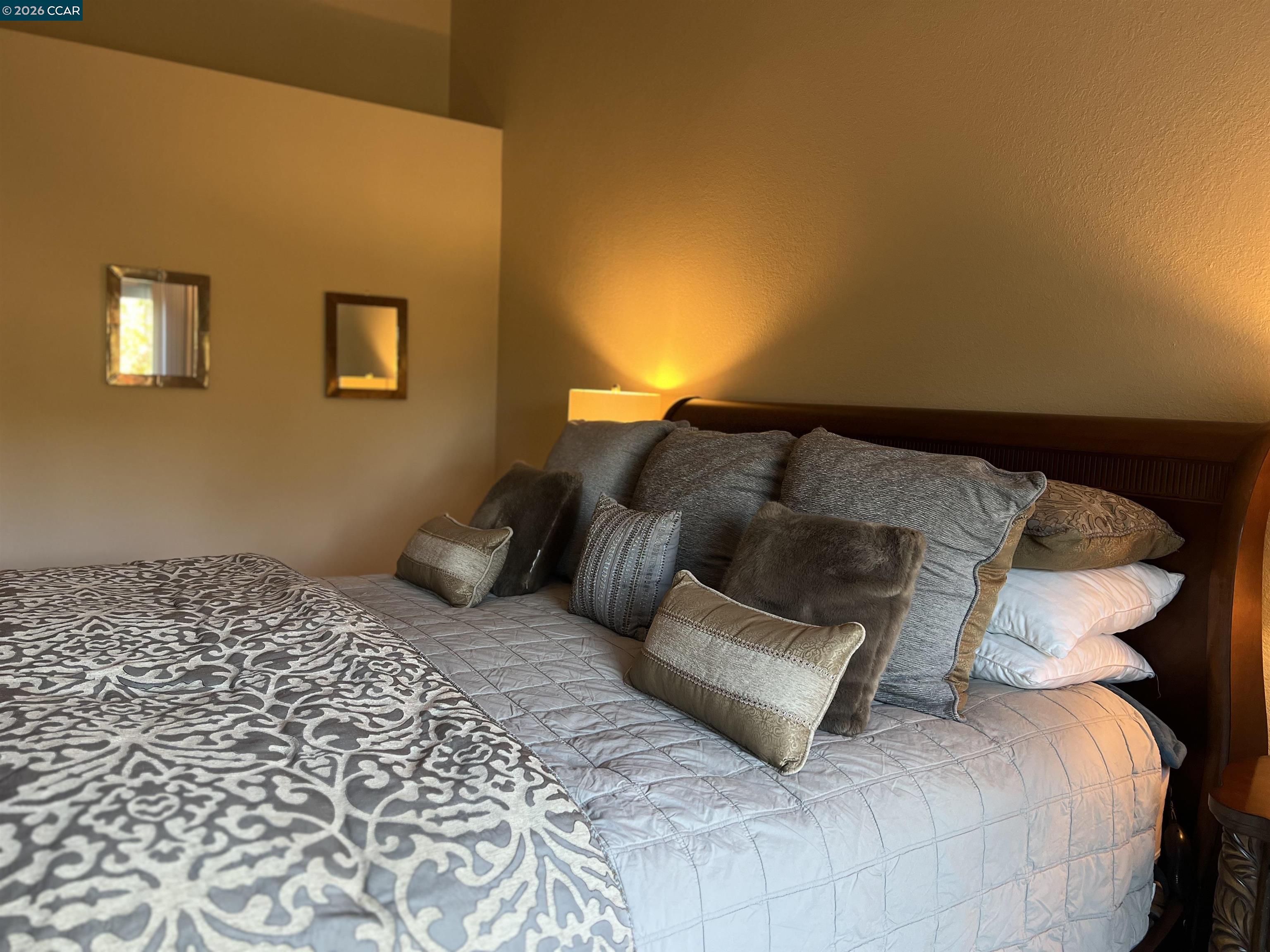 1312 Canyon Side Avenue San Ramon, CA 94582 - Photo 20 of 41 a bed sitting in a bedroom next to a window