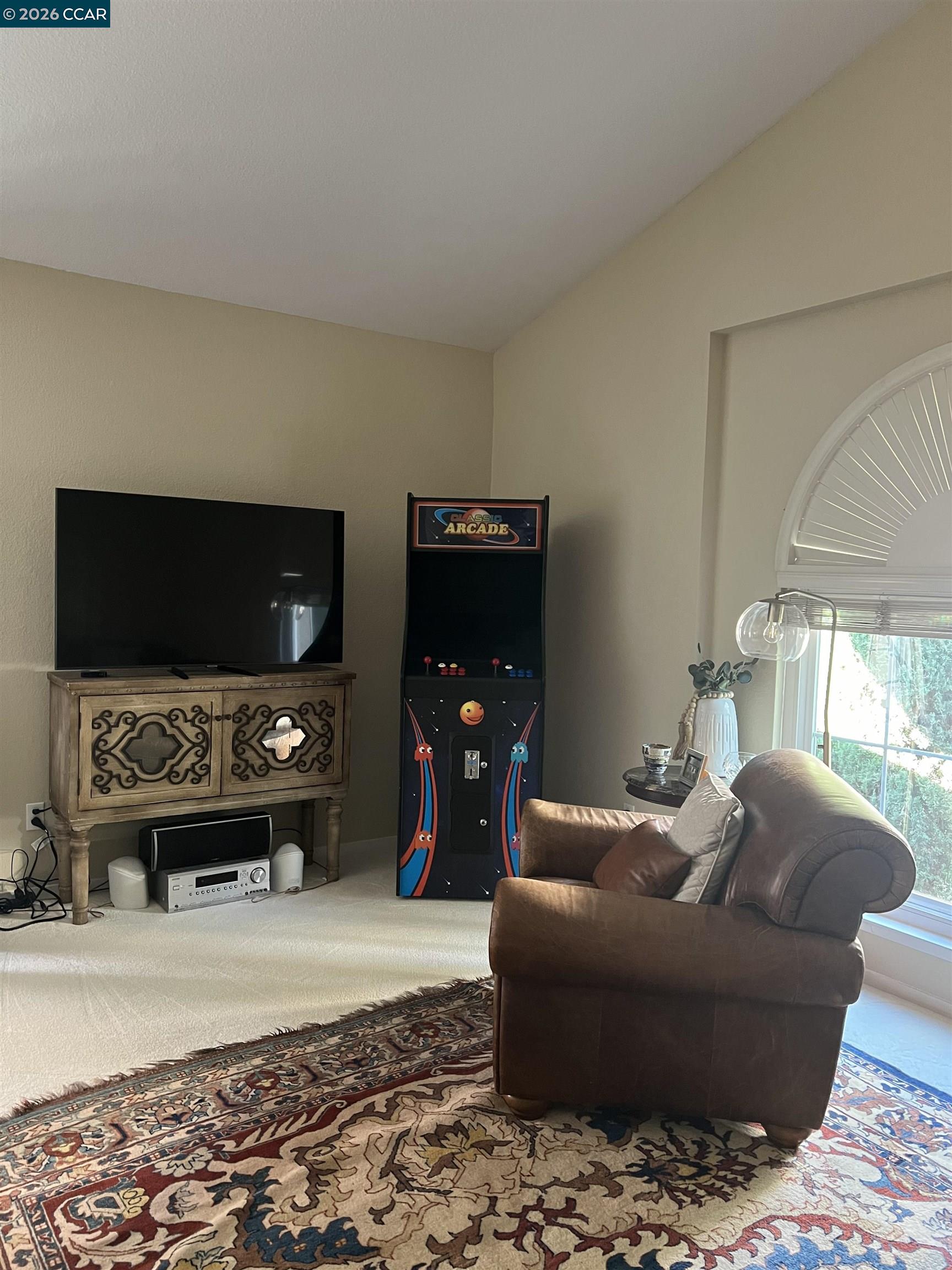 1312 Canyon Side Avenue San Ramon, CA 94582 - Photo 29 of 41 a living room with furniture and a flat screen tv