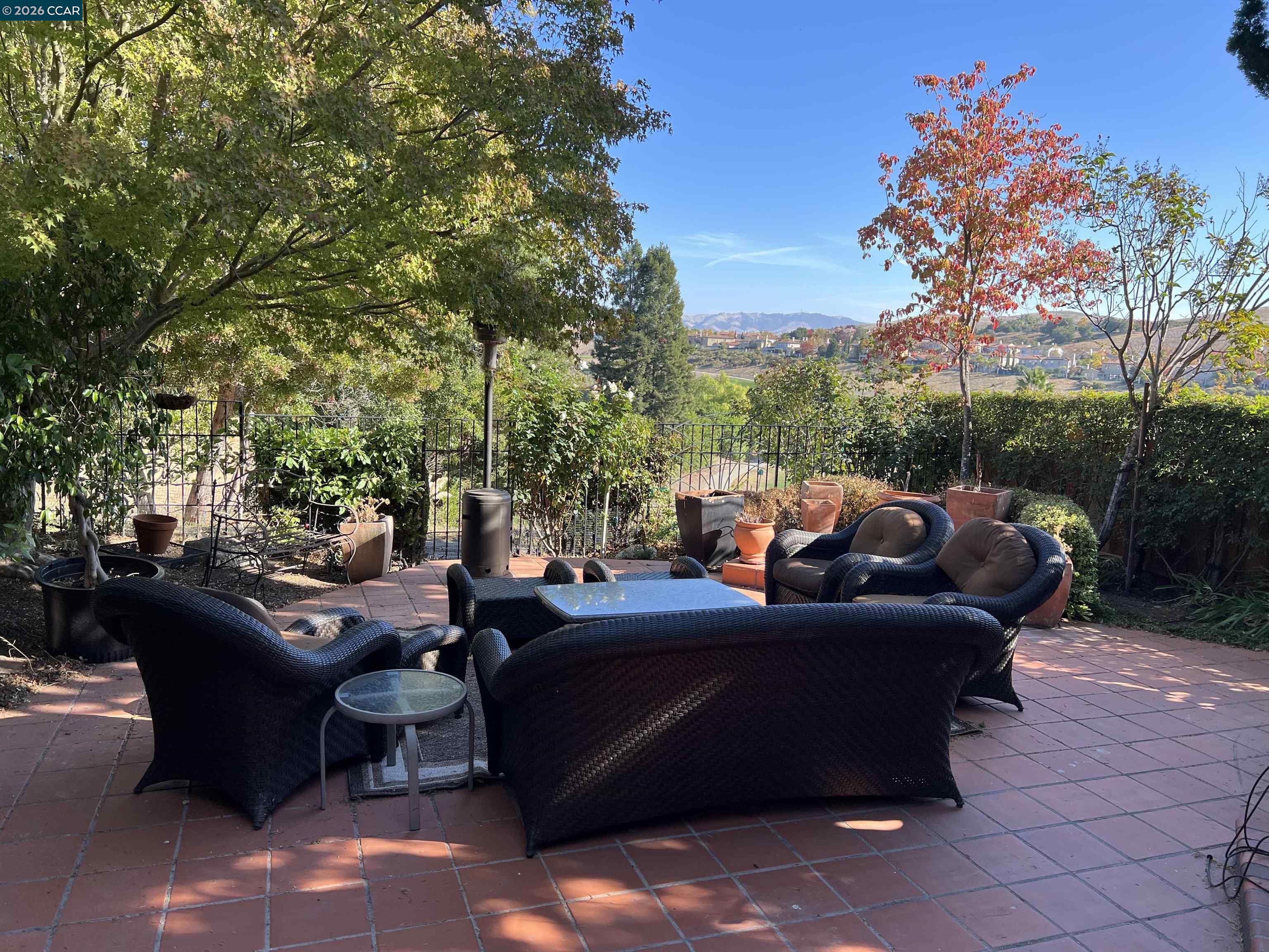 1312 Canyon Side Avenue San Ramon, CA 94582 - Photo 34 of 41 a view of a patio with couches table and chairs and potted plants
