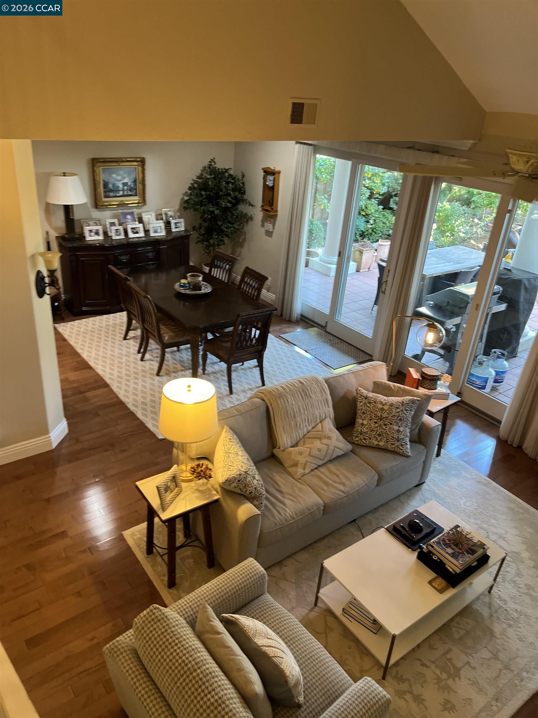 1312 Canyon Side Avenue San Ramon, CA 94582 - Photo 6 of 41 a living room with furniture and a floor to ceiling window