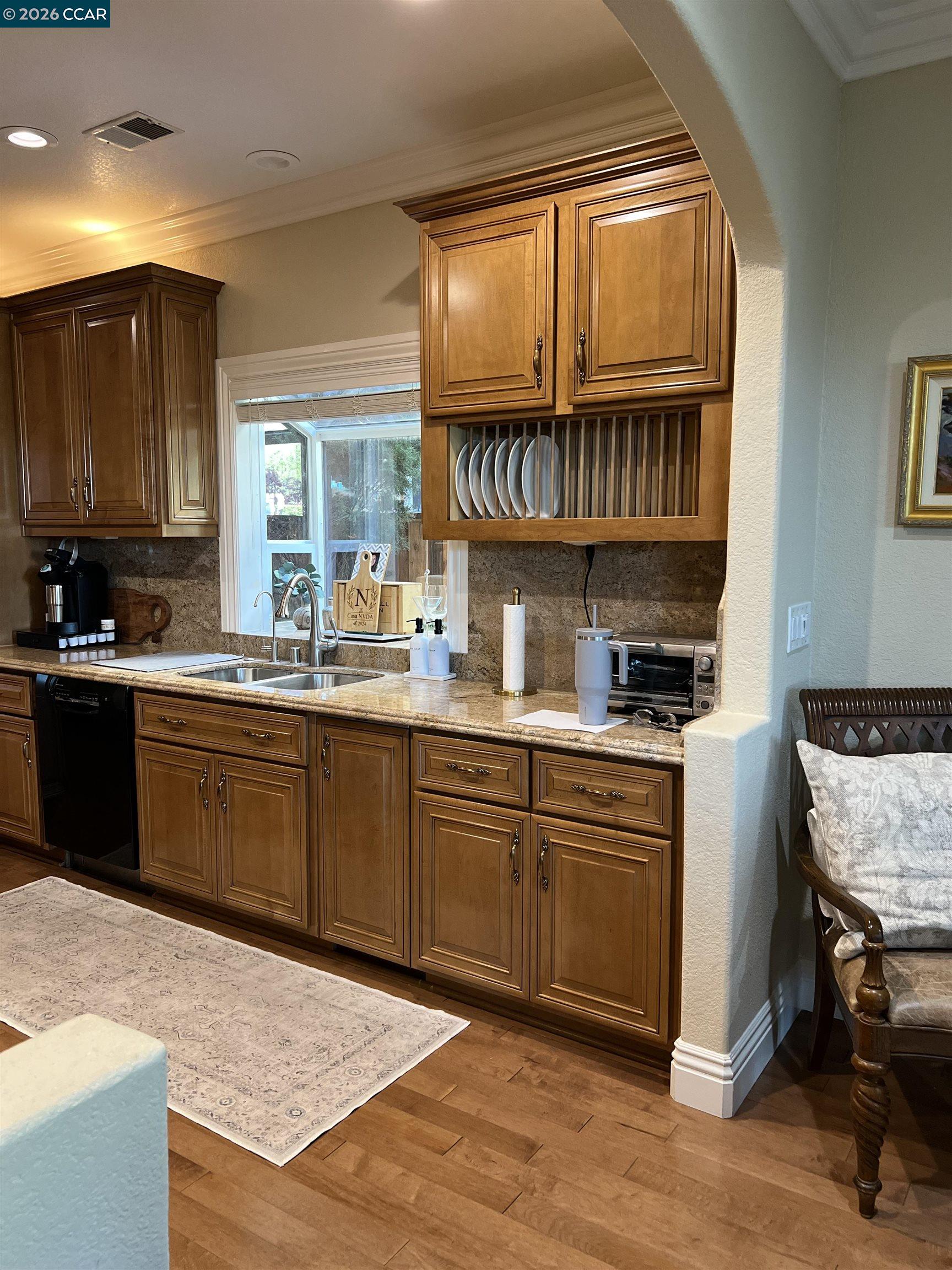 1312 Canyon Side Avenue San Ramon, CA 94582 - Photo 9 of 41 a kitchen with a sink cabinets and window