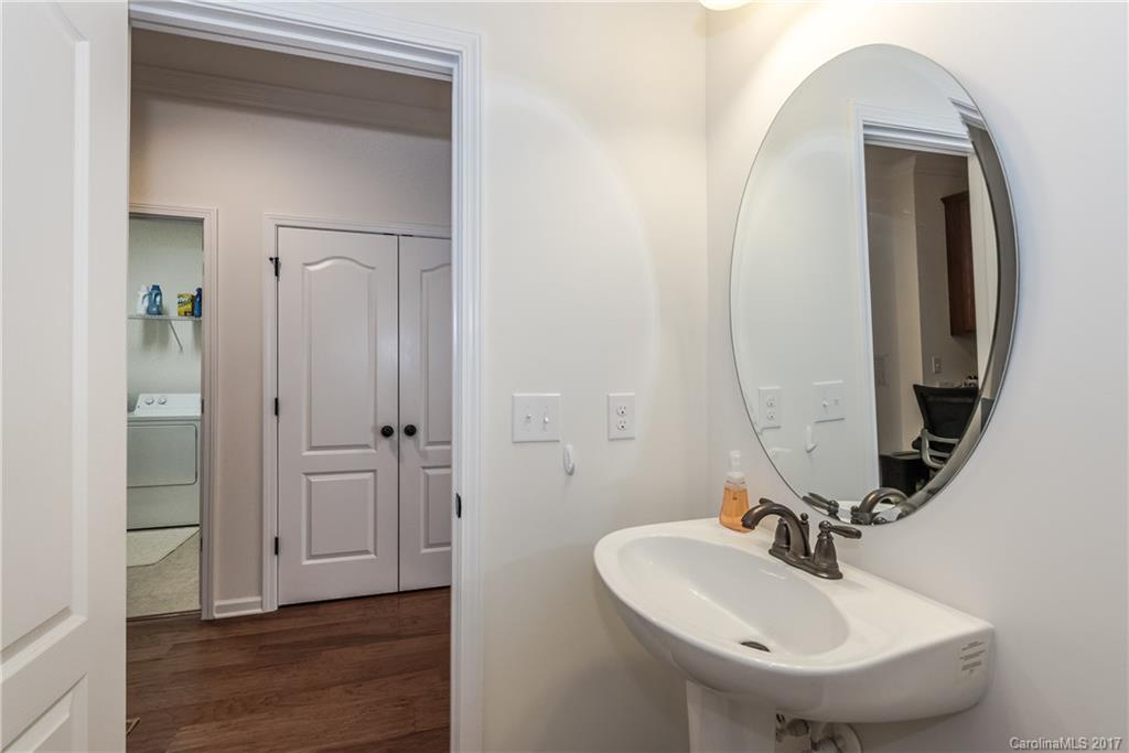 541 Brookhaven Drive, Unit 76 Fort Mill, SC 29708 - Photo 11 of 24 a bathroom with a sink and a mirror