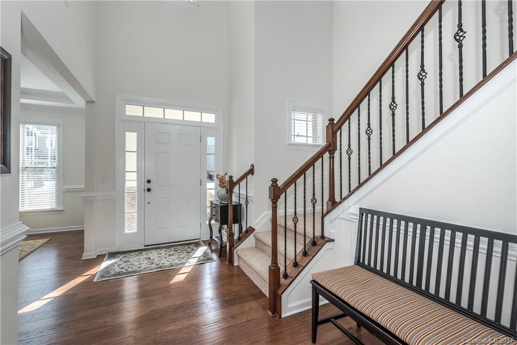 541 Brookhaven Drive, Unit 76 Fort Mill, SC 29708 - Photo 3 of 24 a view of an entryway with wooden floor and stairs