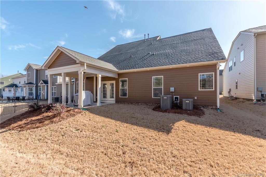 541 Brookhaven Drive, Unit 76 Fort Mill, SC 29708 - Photo 24 of 24 a front view of a house with a yard covered in snow