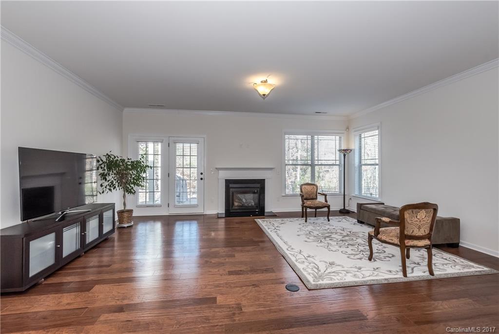 541 Brookhaven Drive, Unit 76 Fort Mill, SC 29708 - Photo 9 of 24 a living room with furniture fireplace and window