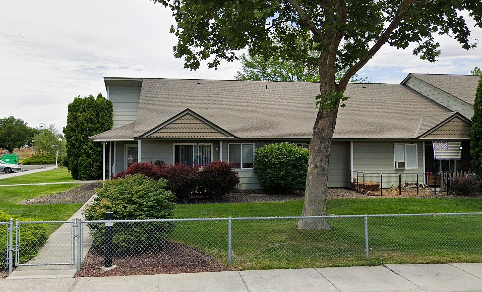 661 South Burke Avenue Connell, WA 99326 - Photo 3 of 7 a front view of a house with a yard