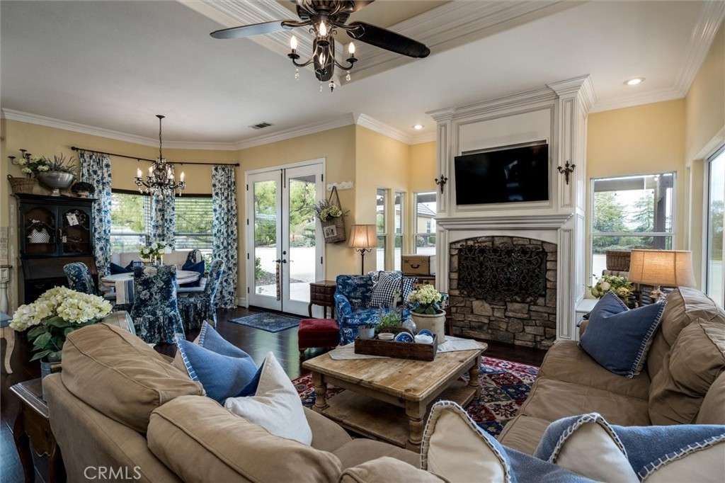 14787 Wood Road Riverside, CA 92508 - Photo 17 of 64 a living room with furniture fireplace and flat screen tv