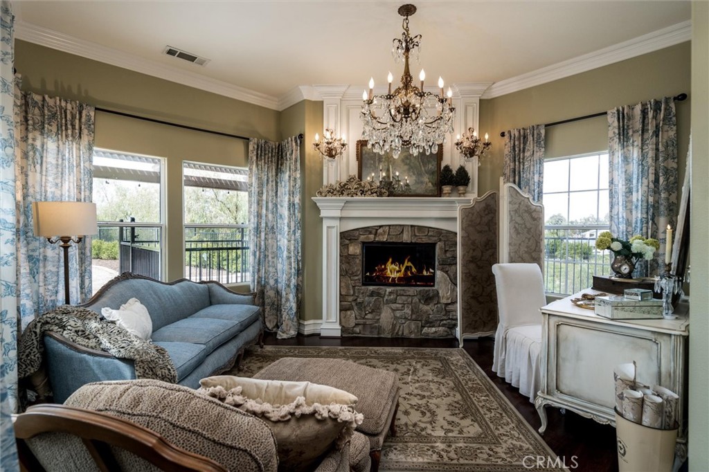 14787 Wood Road Riverside, CA 92508 - Photo 25 of 64 a living room with furniture and a fireplace