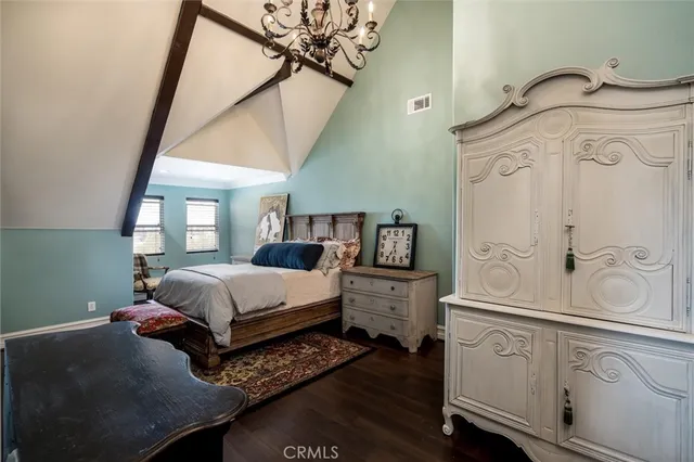 a view of a house with swimming pool and sitting area