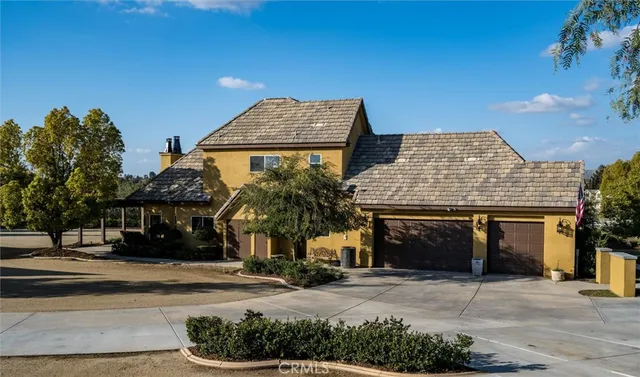 a view of houses with outdoor space and street view