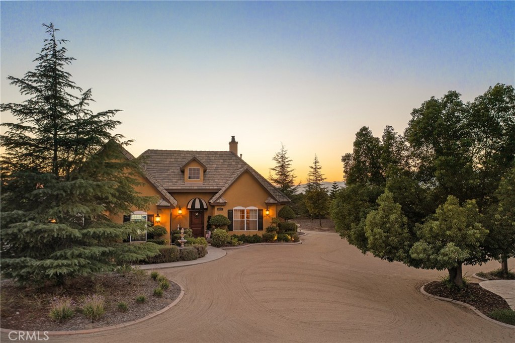 14787 Wood Road Riverside, CA 92508 - Photo 36 of 64 a front view of a house with a yard