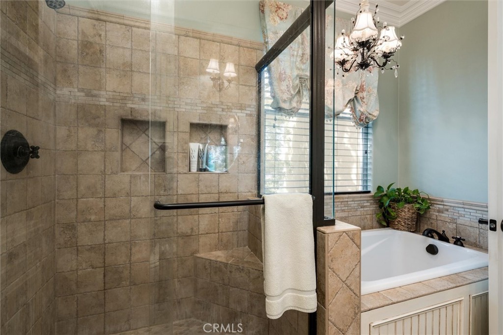 14787 Wood Road Riverside, CA 92508 - Photo 46 of 64 a bathroom with a sink a toilet and shower