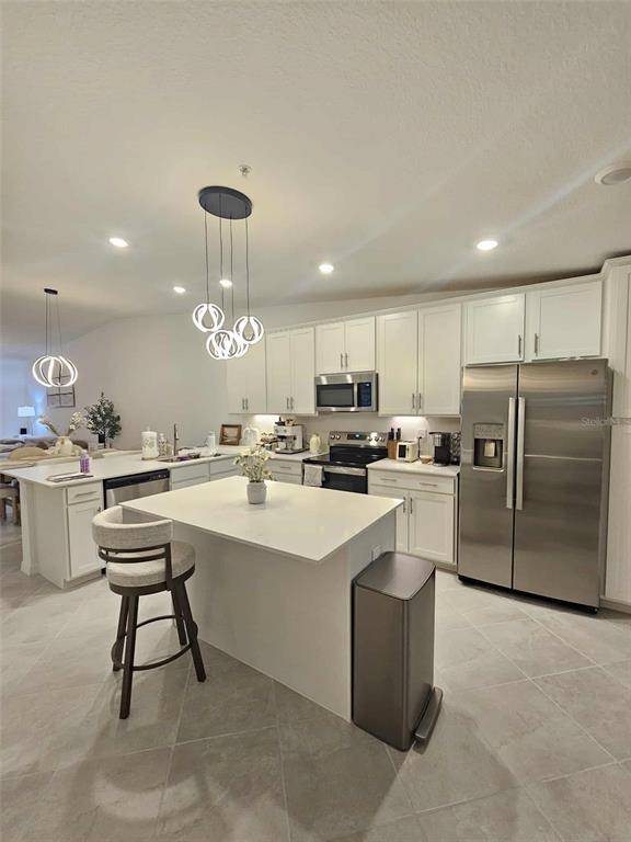 17470 Opal Sand Drive, Unit 201 Venice, FL 34293 - Photo 18 of 49 a kitchen with counter space cabinets and appliances