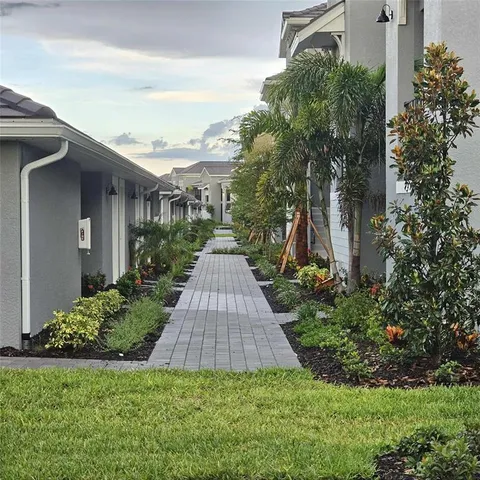 a view of a back yard of the house