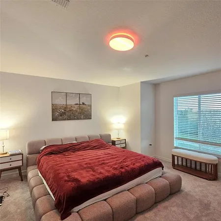 a view of room with furniture and window