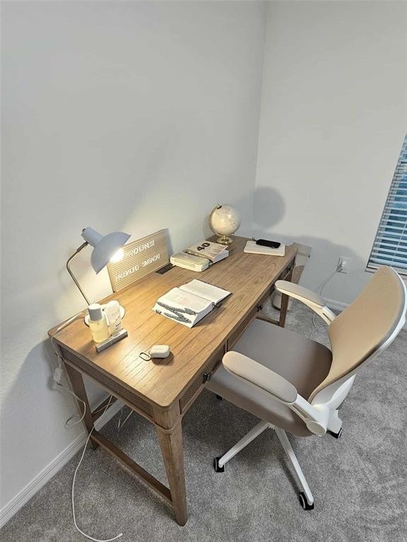 17470 Opal Sand Drive, Unit 201 Venice, FL 34293 - Photo 38 of 49 a room with a table chairs and wooden floor