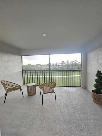 a view of a balcony with ocean view