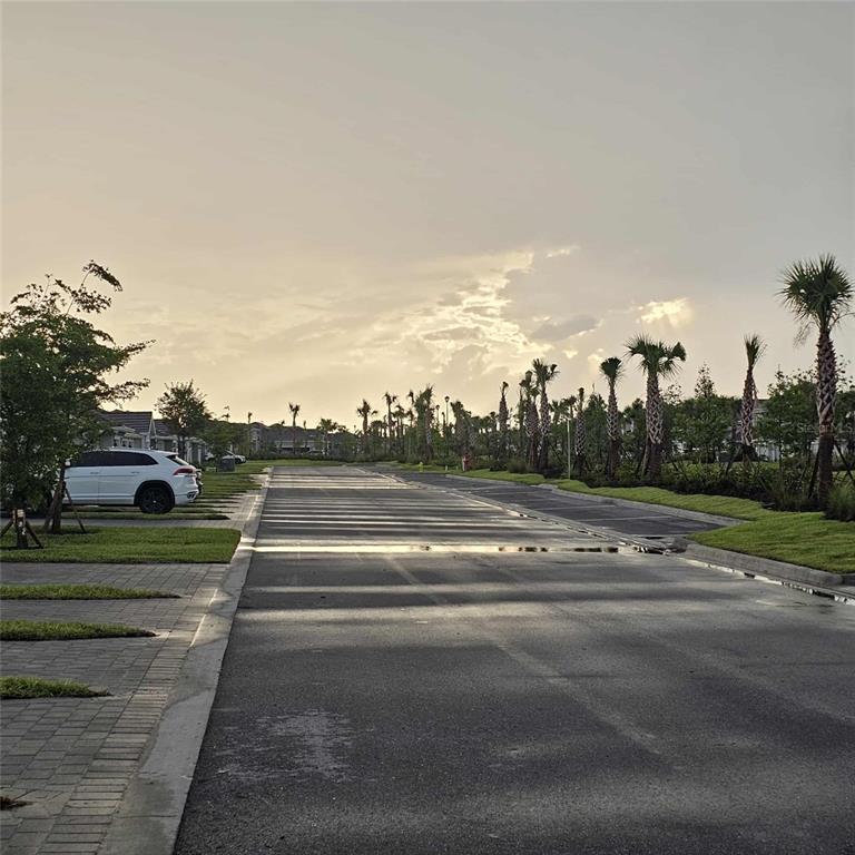 17470 Opal Sand Drive, Unit 201 Venice, FL 34293 - Photo 45 of 49 a view of street with houses