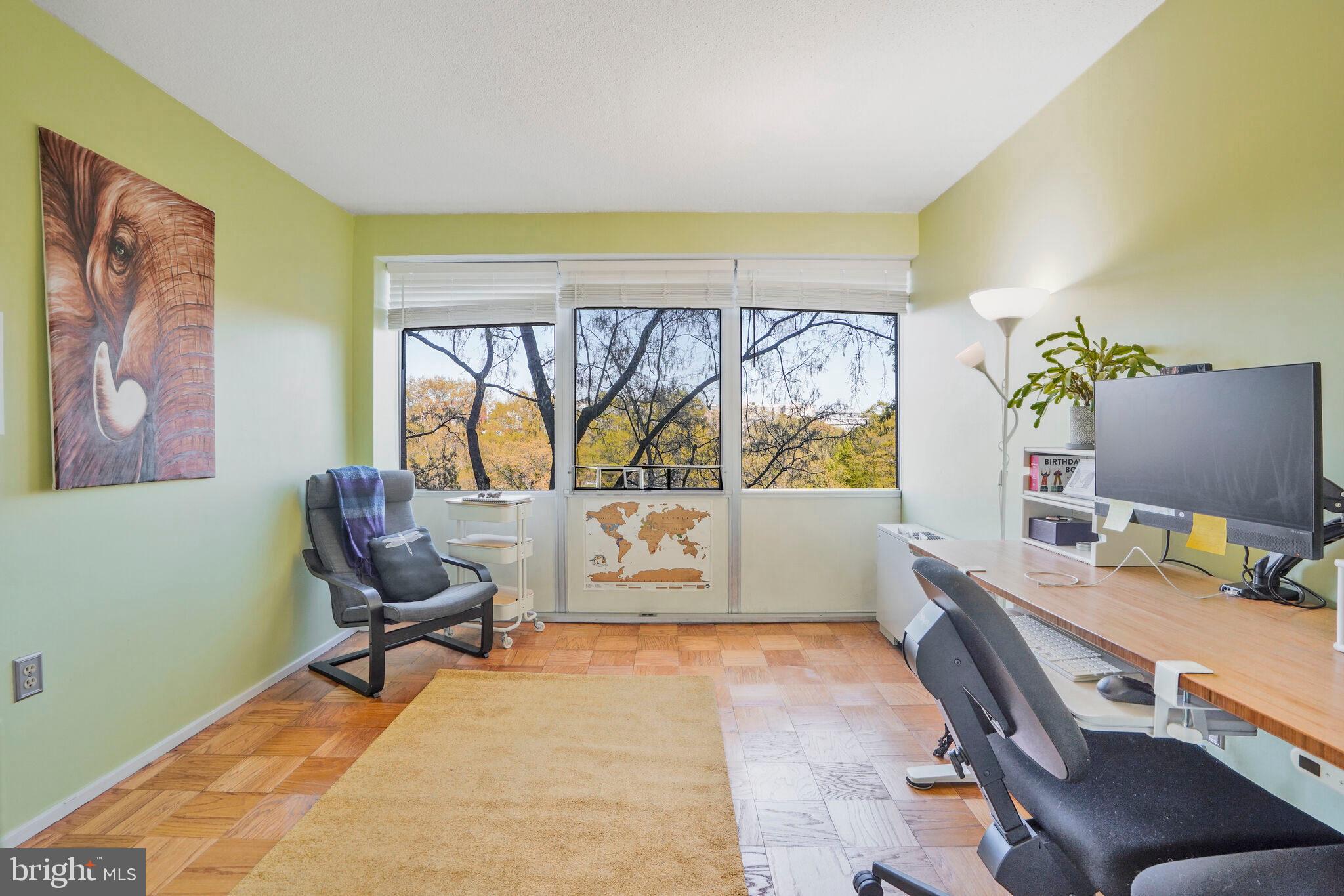 1301 Delaware Avenue Southwest, Unit N514 Washington, DC 20024 - Photo 14 of 44 a reading room with furniture and a window