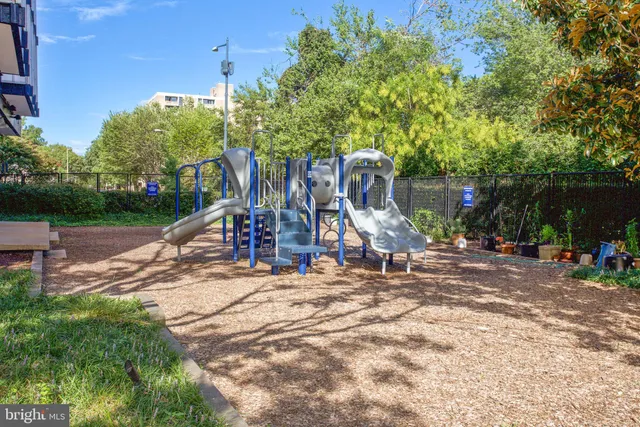 a bathroom with a sink toilet and mirror