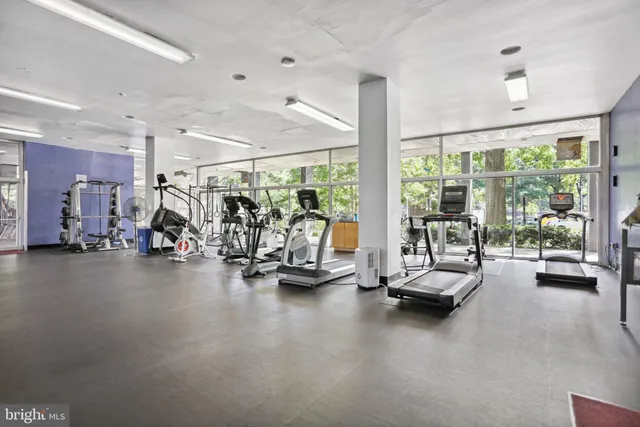 a view of a park with swings and slides