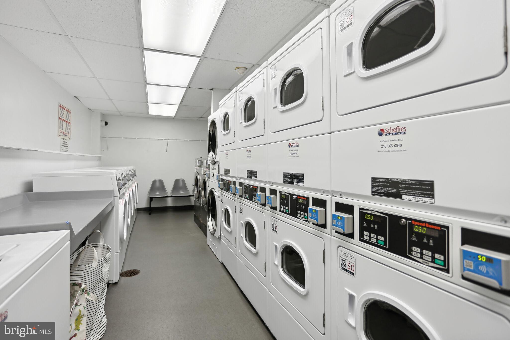 1301 Delaware Avenue Southwest, Unit N514 Washington, DC 20024 - Photo 24 of 44 a utility room with dryer and washer