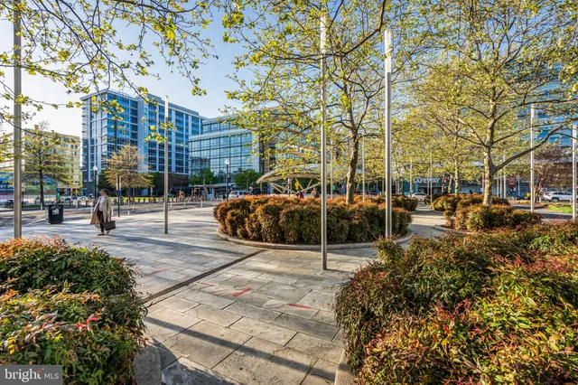 a view of a building with sitting area