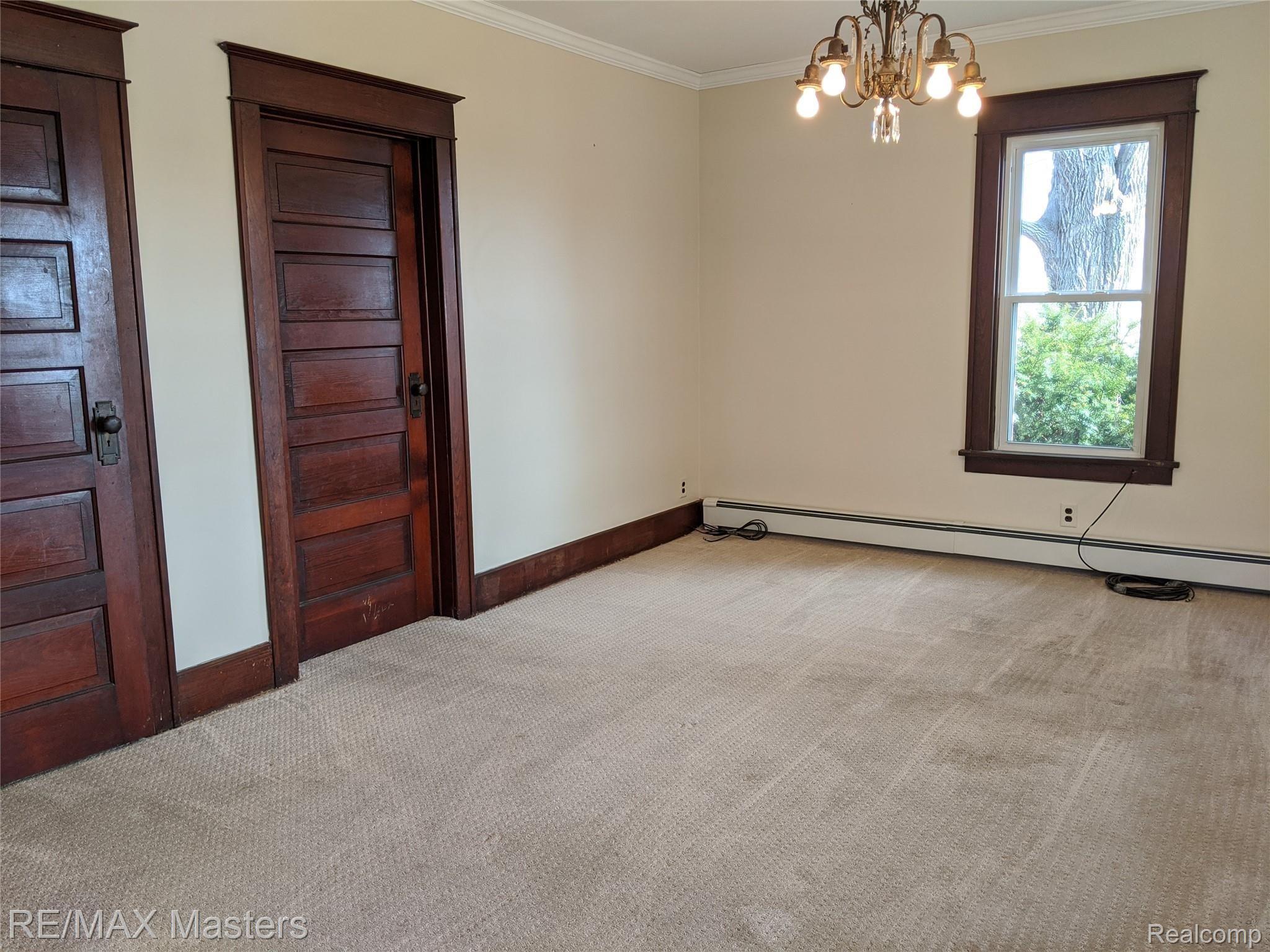5644 Zink Road Maybee, MI 48159 - Photo 5 of 38 Living Room, Left Door To Upstairs, Right Door To Laundry And Full Bath