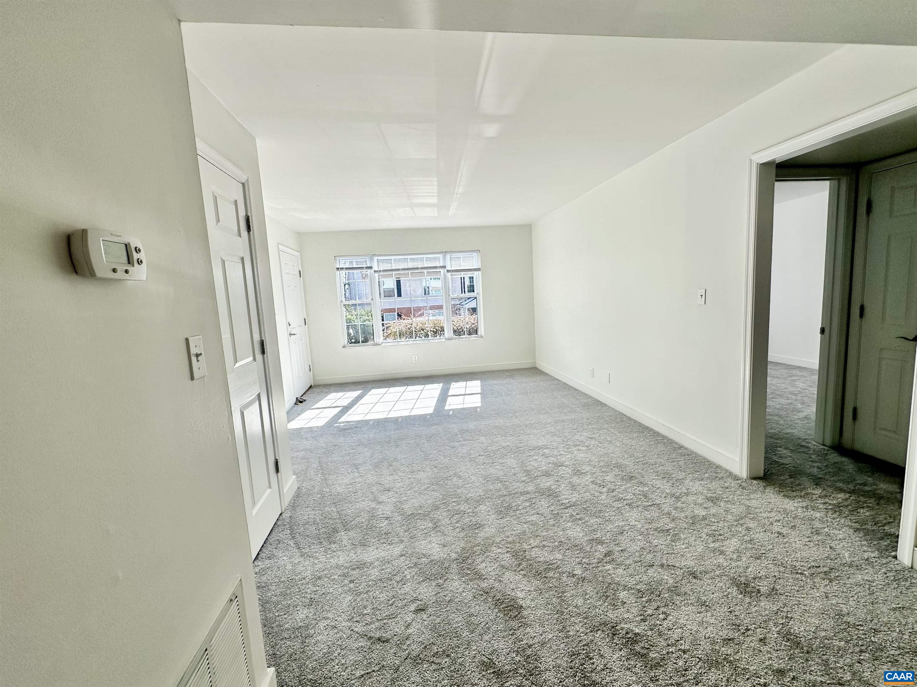 890 Fountain Court, Unit MULTIPLE S Charlottesville, VA 22901 - Photo 4 of 19 an empty room with windows