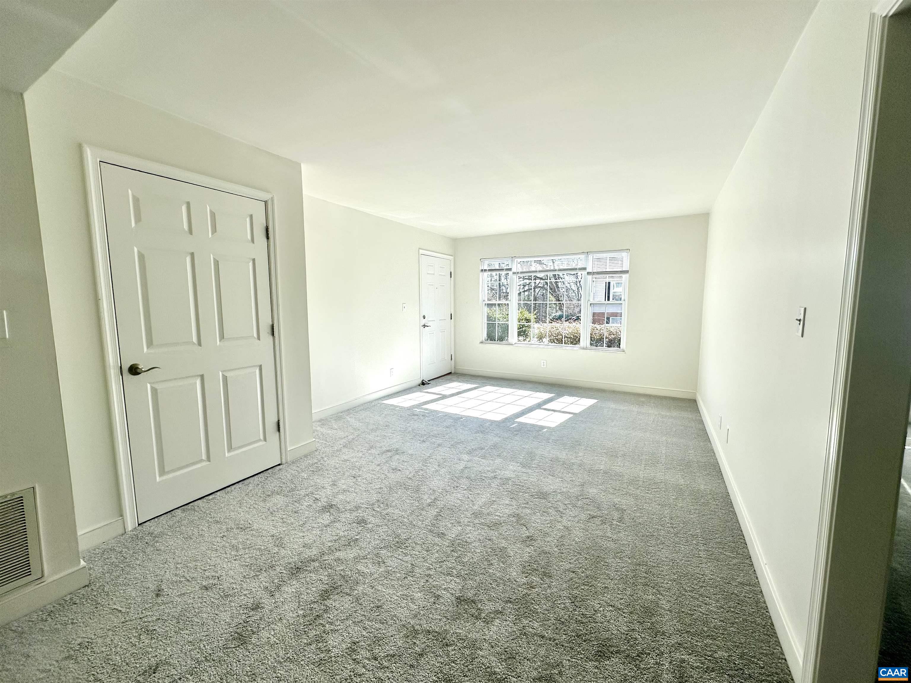 890 Fountain Court, Unit MULTIPLE S Charlottesville, VA 22901 - Photo 5 of 19 an empty room with windows