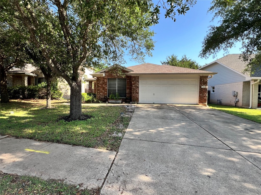 503 Territory Trail Cedar Park, TX 78613 - Photo 1 of 1 a front view of house with yard and green space