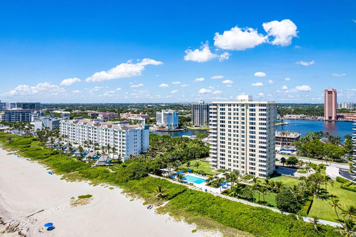 750 South Ocean Boulevard, Unit 5N Boca Raton, FL 33432 - Photo 29 of 30 a view of a city with flower plants and wooden fence