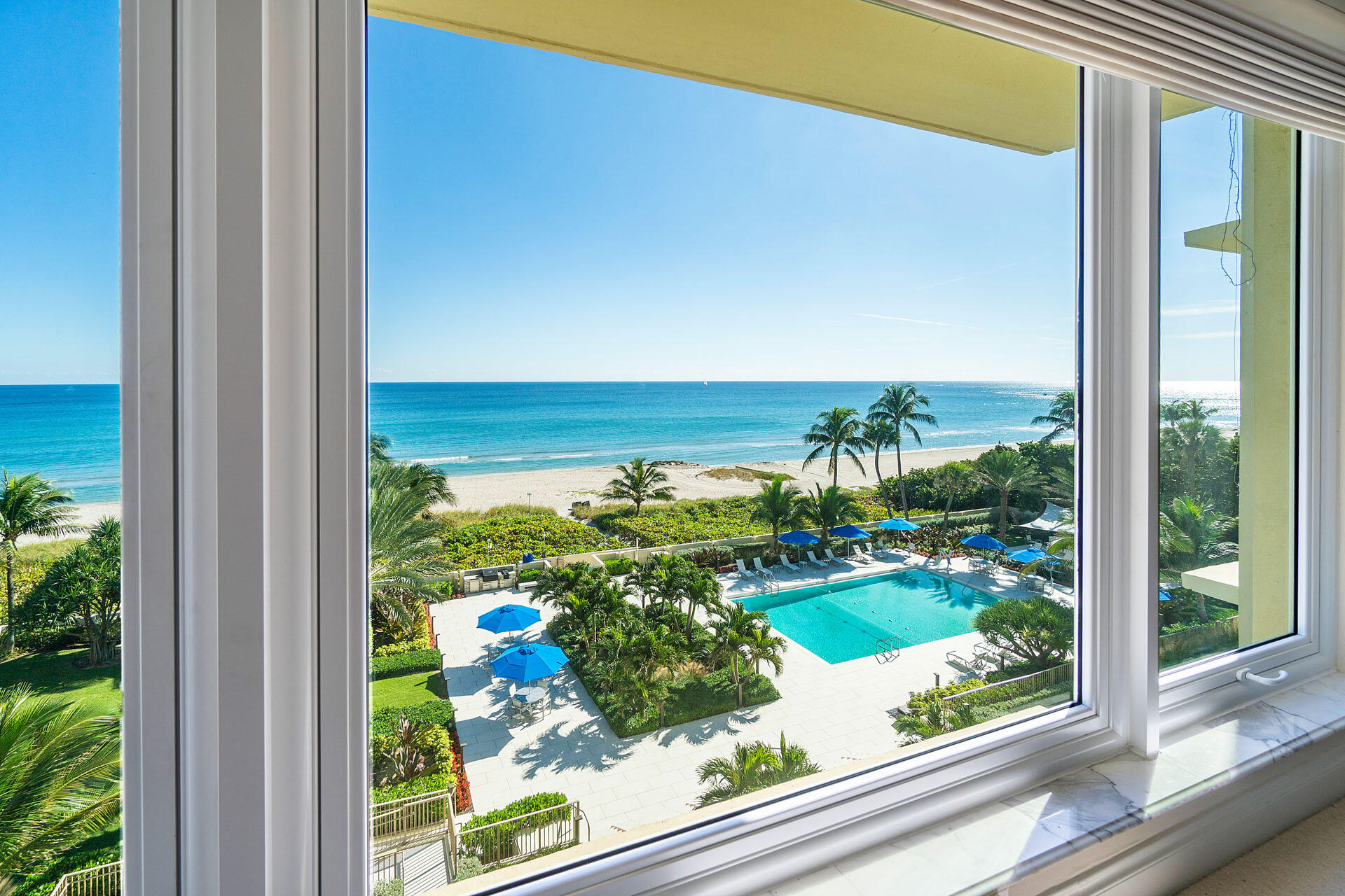750 South Ocean Boulevard, Unit 5N Boca Raton, FL 33432 - Photo 7 of 30 a view of a garden from a window