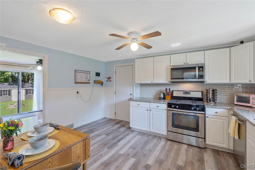 47 Macarthur Road Lysander, NY 13027 - Photo 18 of 34 Plenty of light in the kitchen space