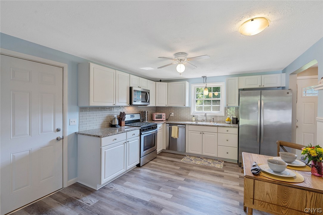 47 Macarthur Road Lysander, NY 13027 - Photo 2 of 34 Updated kitchen with newer granite, stainless stee