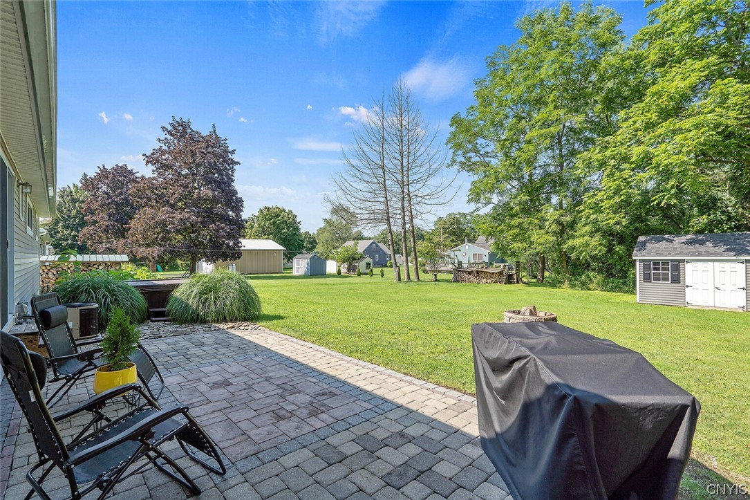 47 Macarthur Road Lysander, NY 13027 - Photo 24 of 34 Newer paver patio provides lots of entertaining sp