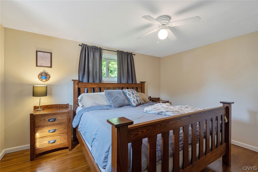 47 Macarthur Road Lysander, NY 13027 - Photo 25 of 34 Primary bedroom with king size bed