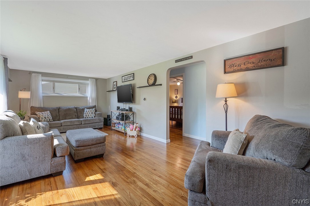 47 Macarthur Road Lysander, NY 13027 - Photo 3 of 34 Spacious living room gleaming hardwood floors